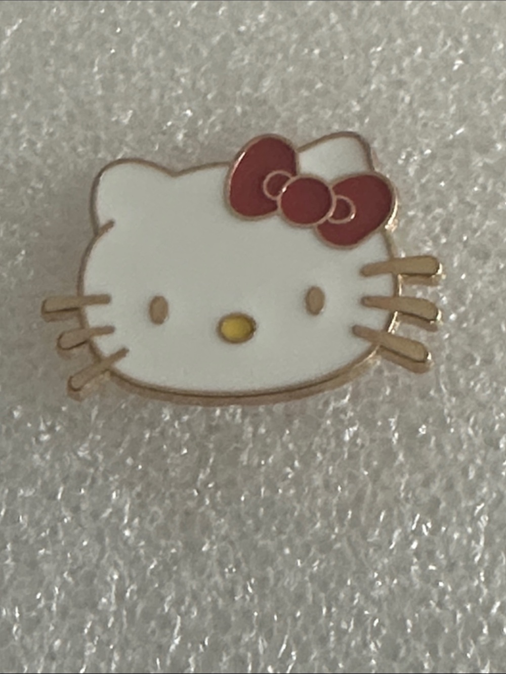 Sanrio Hello Kitty White Face with Red Bow Enamel Pin